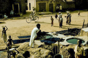 Cloth is still dyed in traditional ways by the Hausa people at the dye pits in Kano, Nigeria.